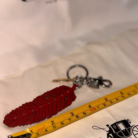 Coach Red Feather Keychain with Gold Charm - Picture 3 of 3